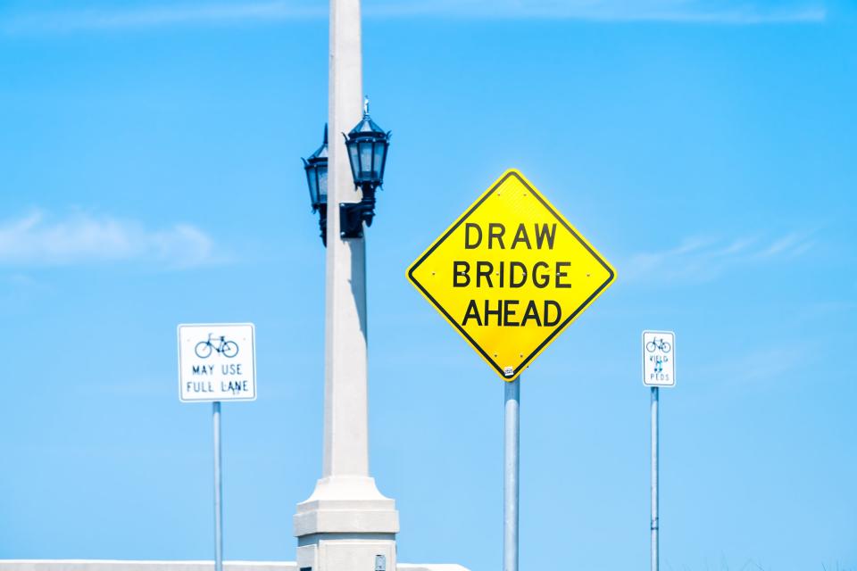 <p>Florida driver caught on video smashing through barrier and jumping over rising drawbridge</p> (Getty Images/iStockphoto)