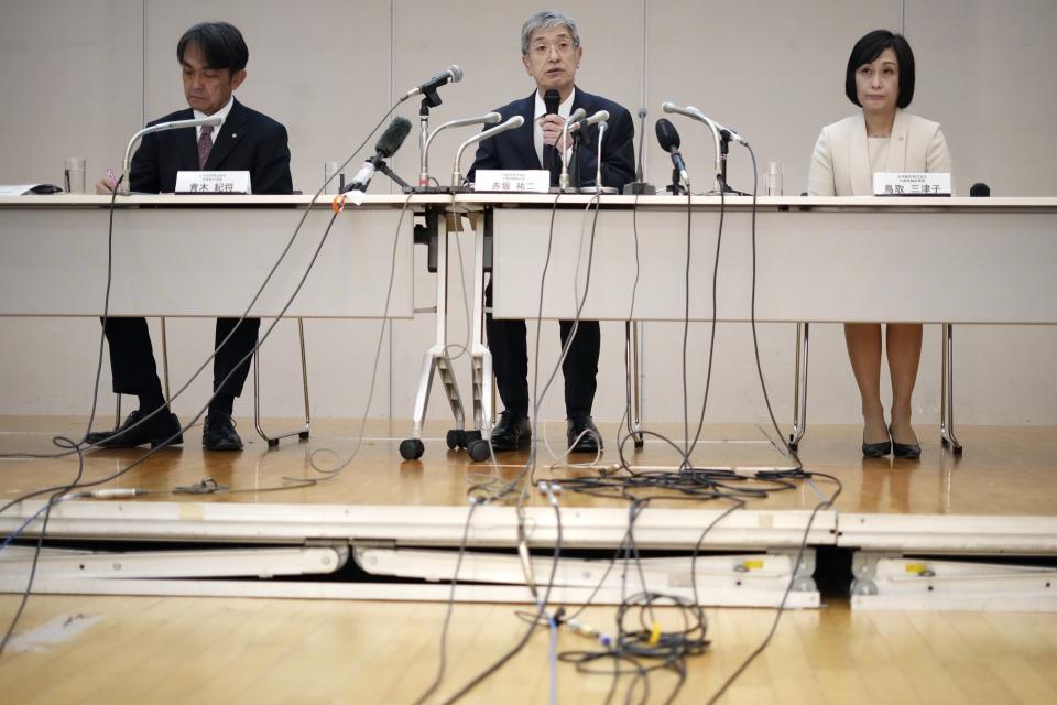 Yuji Akasaka, center, President and CEO of Japan Airlines speaks on a collision accident involving Japan Airlines Flight JL516 and Japan Coast Guard aircraft during a regular press conference in Tokyo, Wednesday, Jan. 17, 2024. Japan Airlines has named Mitsuko Tottori as its first woman president following a collision between one of its planes and a coast guard aircraft during Japanese New Year holidays that left five dead. Tottori will replace JAL president and CEO Yuji Akasaka, who will take over as chairman. (AP Photo/Eugene Hoshiko)