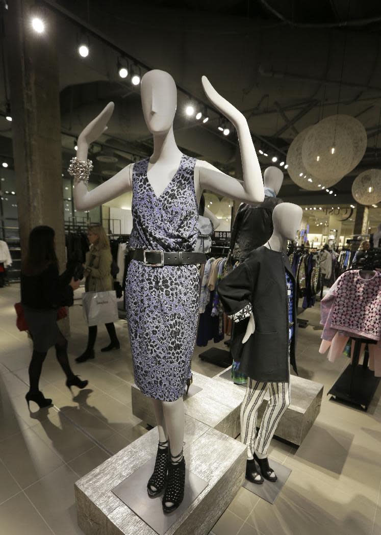 This March 6, 2014 photo shows spring fashions displayed at the Neiman Marcus NorthPark Center store in Dallas. From pops of pink to outfits of black and white, spring trends are beginning to bloom at Highland Park Village, an upscale outdoor shopping center in Dallas. (AP Photo/LM Otero)