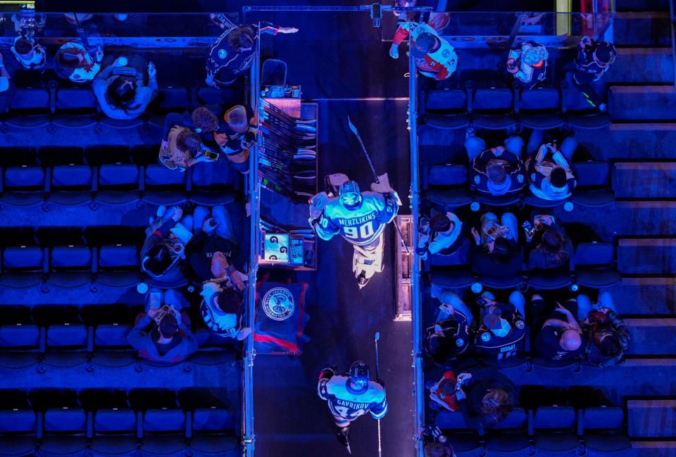 Columbus Blue Jackets goaltender Elvis Merzlikins (90) leads the team onto the ice for warm ups prior to the NHL game against the Ottawa Senators at Nationwide Arena on April 22, 2022. 