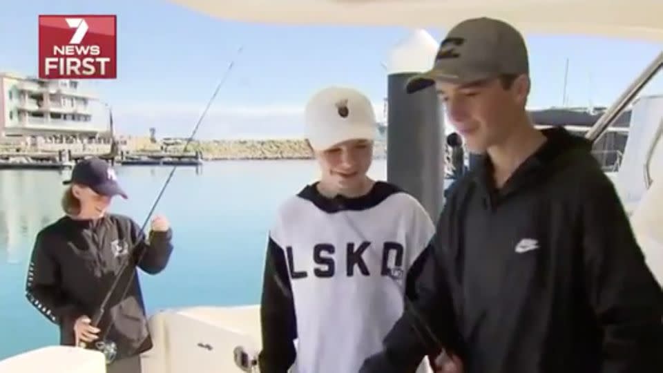 Brothers Mitchell and Lewis Williamson and their cousin Brodie Moller had the best seats in the house when the ravenous sharks feasted. Source: 7 News