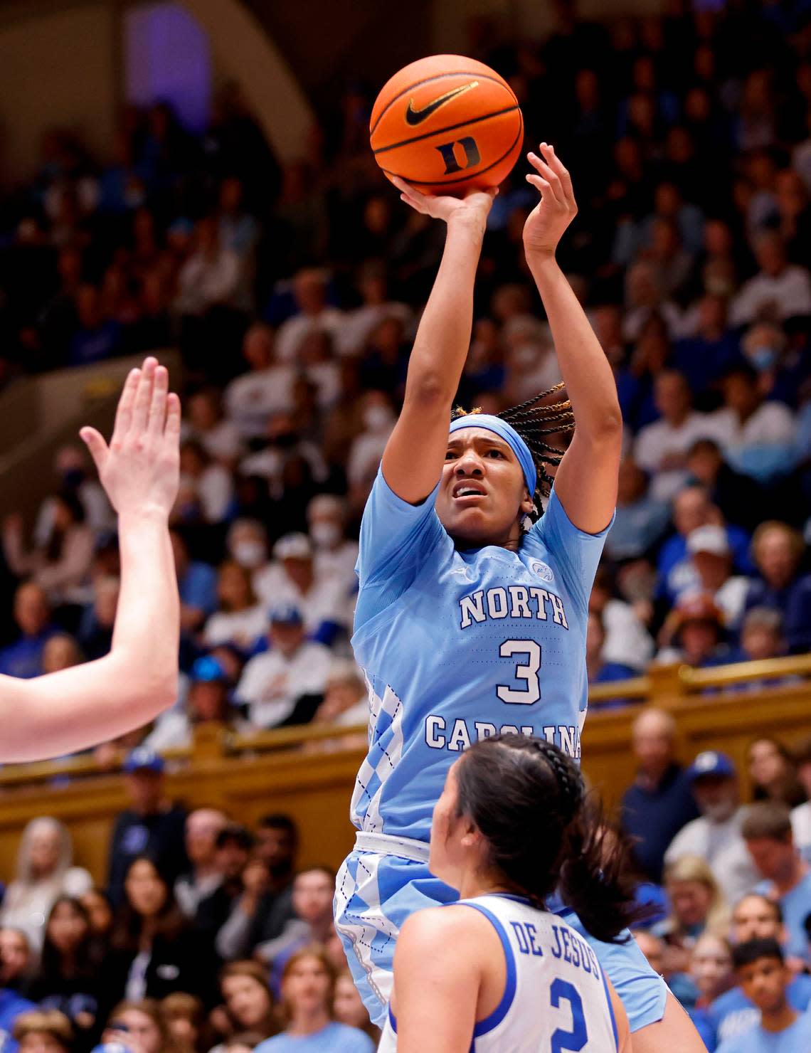 North Carolina’s Kennedy Todd-Williams shoots over Duke’s Vanessa de Jesus during the second half half of the Tar Heels’ 45-41 win over Duke on Sunday, Feb. 26, 2023, at Cameron Indoor Stadium in Durham, N.C.