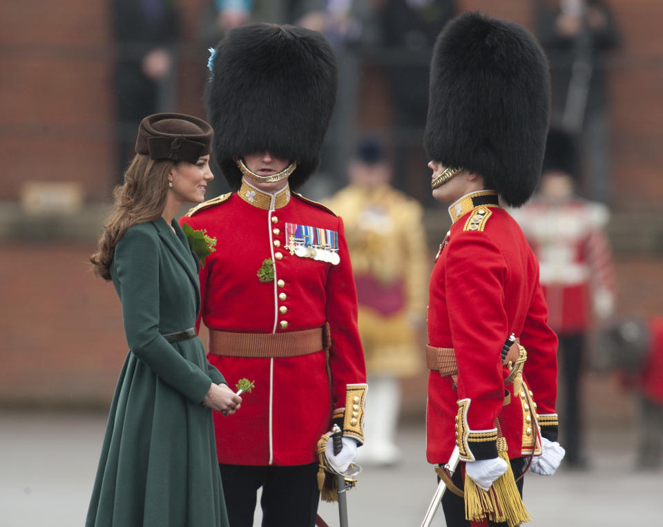 The Duchess Of Cambridge Presents Shamrocks To The Irish Guards At The St Patrick's Day Parade At Mons Barracks In Aldershot. (Photo by Mark Cuthbert/UK Press via Getty Images)