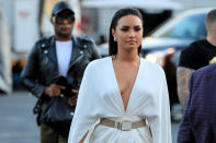 <p>Singer Demi Lovato arrives for the super welterweight boxing match between Floyd Mayweather Jr. and Conor McGregor on August 26, 2017 at T-Mobile Arena in Las Vegas, Nevada. (Photo by Sean M. Haffey/Getty Images) </p>