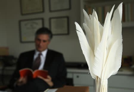 Attorney Jonathan Franklin works at his desk at the Norton Rose Fulbright & Jaworski law firm in Washington November 25, 2014. REUTERS/Gary Cameron