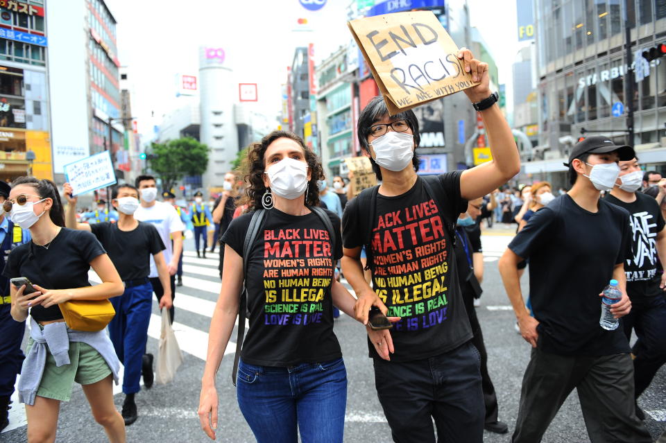 TOKYO, JAPAN - JUNE 6 : People attend a demonstration in Tokyo, Japan against racism and police violence in echo to the killing of a black man, George Floyd in the US at the hands of a white police office, on June 6, 2020. (Photo by David Mareuil/Anadolu Agency via Getty Images)