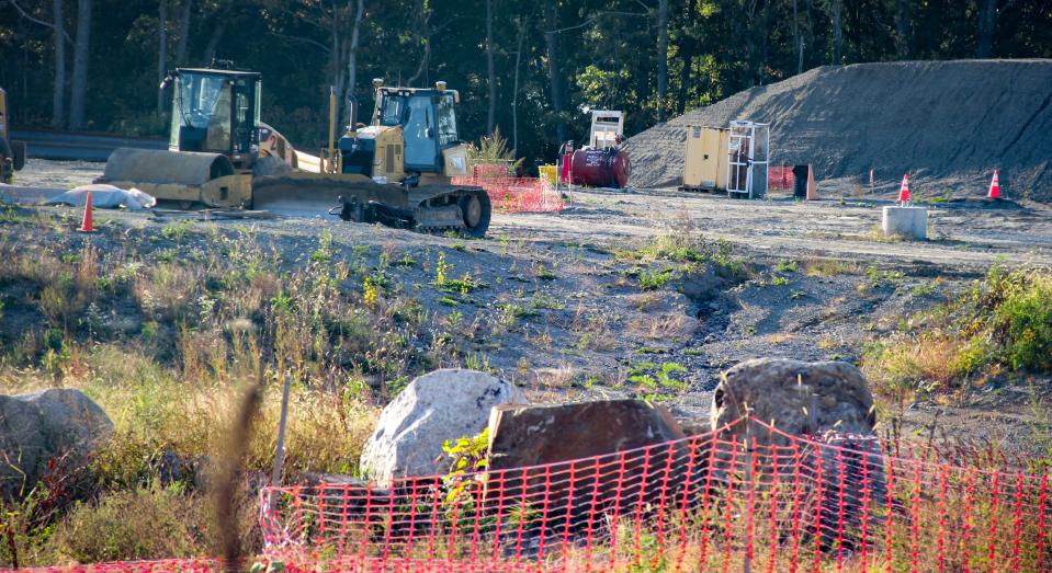 Construction equipment sits on the site of the Weaver's Cove layover facility, part of the South Coast Rail project.