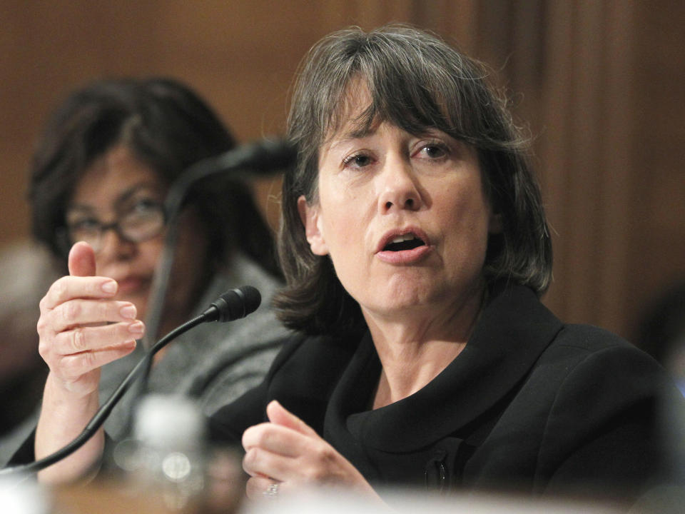 FILE - In this Dec. 1, 2010 file photo, Federal Deposit Insurance Corporation (FDIC) Chair Sheila Bair, right, testifies on Capitol Hill in Washington. Bair is stepping down as chair of the FDIC this summer, ending a five-year term in which she helped craft the government's response to the 2008 financial crisis. (AP Photo/Manuel Balce Ceneta, File)