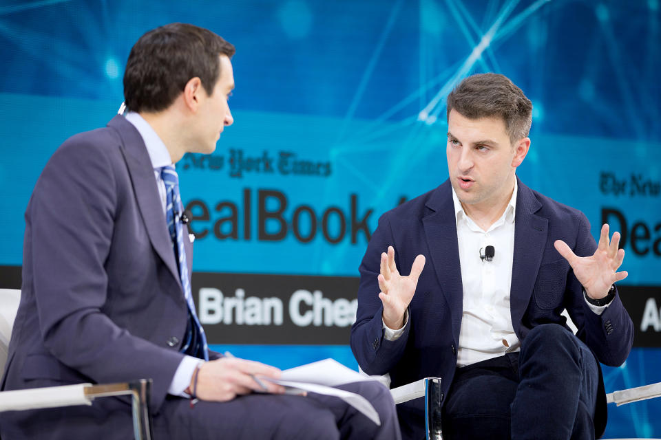NEW YORK, NEW YORK - NOVEMBER 06: Andrew Ross Sorkin, Editor at Large, Columnist and Founder, DealBook, The New York Times speaks with Brian Chesky, Co-Founder, Head of Community and C.E.O., Airbnb onstage at 2019 New York Times Dealbook on November 06, 2019 in New York City. (Photo by Mike Cohen/Getty Images for The New York Times)