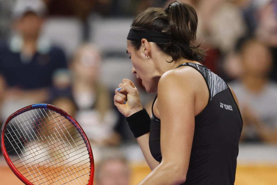 Caroline Garcia, of France, pumps her fist during her match against Aryna Sabalenka, of Belarus, in the singles final of the WTA Finals tennis tournament in Fort Worth, Texas, Monday, Nov. 7, 2022. (AP Photo/Ron Jenkins)