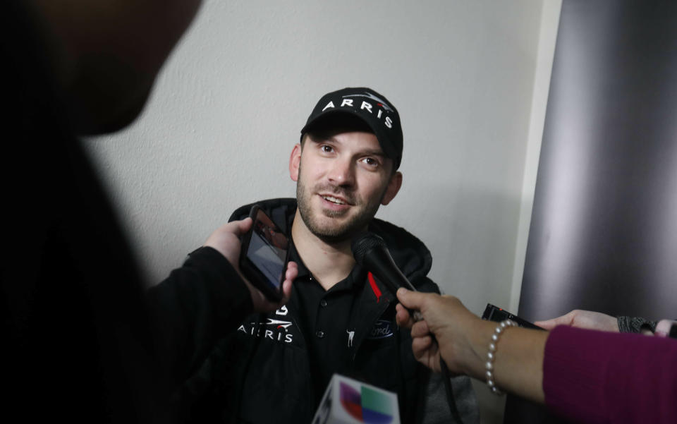 Daniel Suarez speaks to reporters after practice for a NASCAR Cup Series auto race at Texas Motor Speedway in Fort Worth, Texas, Friday, March 29, 2019. (AP Photo/LM Otero)