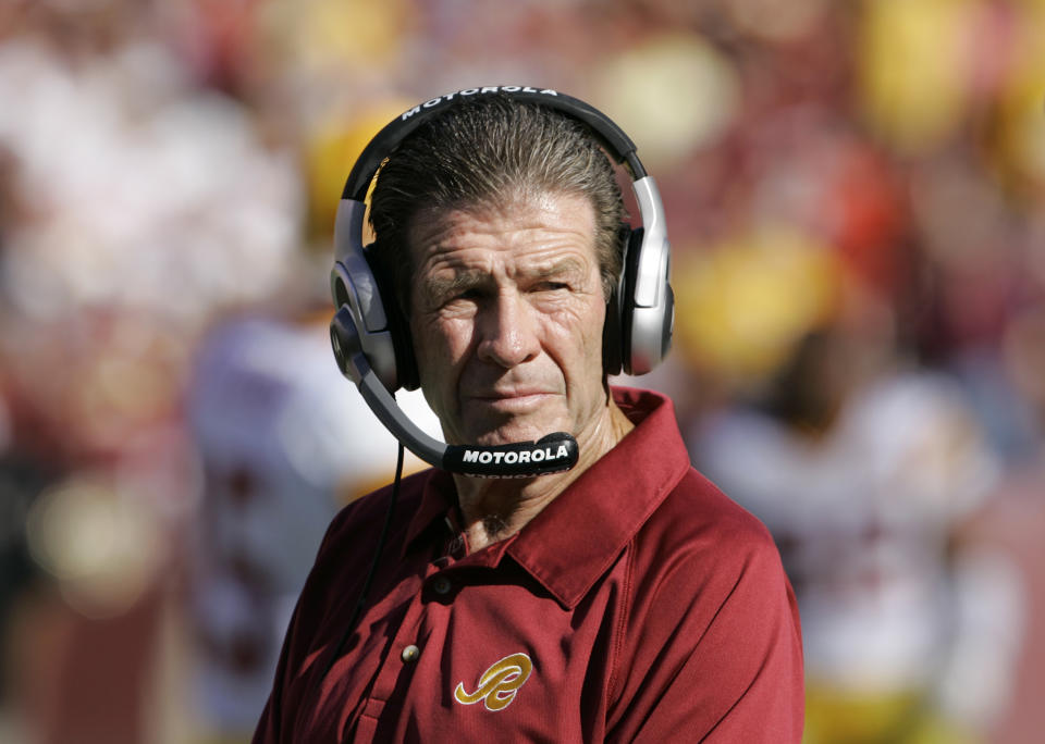 FILE - In this Sept. 23, 2007, file photo, Washington Redskins assistant head coach-offensive Joe Bugel looks on during an NFL football game in Landover, Md. Former Redskins assistant coach Bugel has died. He was 80. The team announced that Bugel died on Sunday, June 28, 2020. It did not disclose a cause of death. (AP Photo/Manuel Balce Ceneta, File)