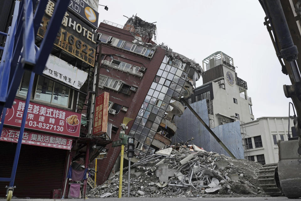 Demolition work is underway at a building collapsed by a powerful earthquake in Hualien City, Taiwan, Saturday, April 6, 2024. Taiwan’s strongest earthquake in 25 years struck Wednesday morning off its east coast. (Suo Takekuma/Kyodo News via AP)