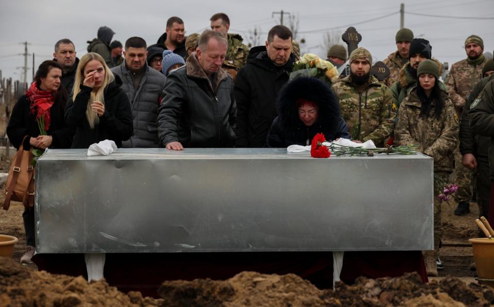 Relatives of the fallen soldier say goodbye to 31-year-old Oleg Adamovsky in Kharkiv - Anadolu Agency/Anadolu