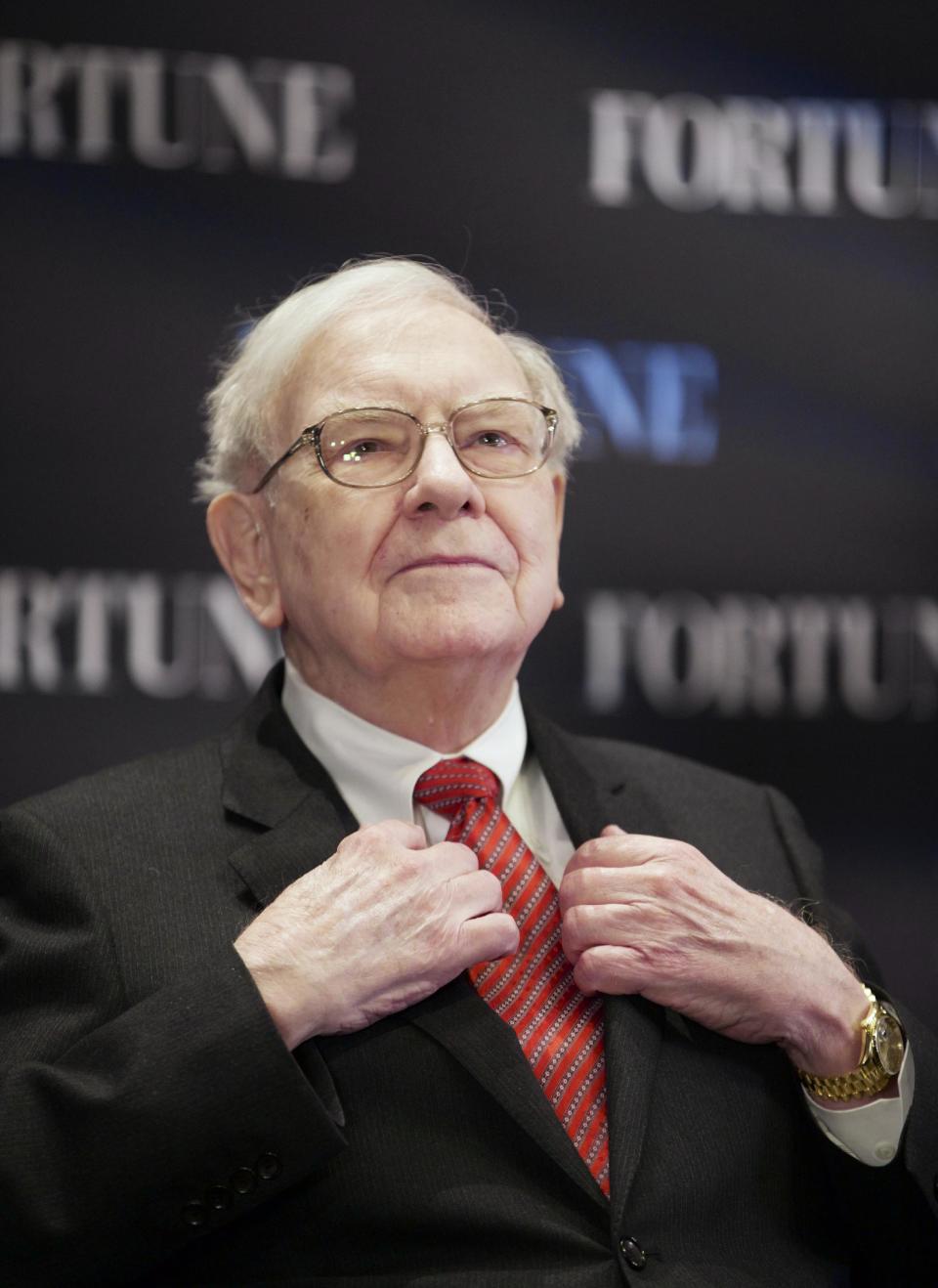 FILE - In this file photo from May 1, 2013, billionaire investor Warren Buffett attends a seminar in Omaha, Neb. Buffett’s failure to beat the stock market in four of the past five years has inspired debate about whether Berkshire Hathaway’s 83-year-old CEO has lost his touch. Buffett and Berkshire Vice Chairman Charlie Munger are likely to face questions about the conglomerate’s performance when more than 30,000 shareholders gather for the company’s annual meeting in Omaha on Saturday. (AP Photo/Nati Harnik, File)