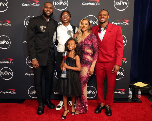 <p>Kevin Mazur/Getty</p> LeBron James, winner of Best Record-Breaking Performance, Bryce James, Zhuri James, Savannah James, and Bronny James attend The 2023 ESPY Awards at Dolby Theatre on July 12, 2023
