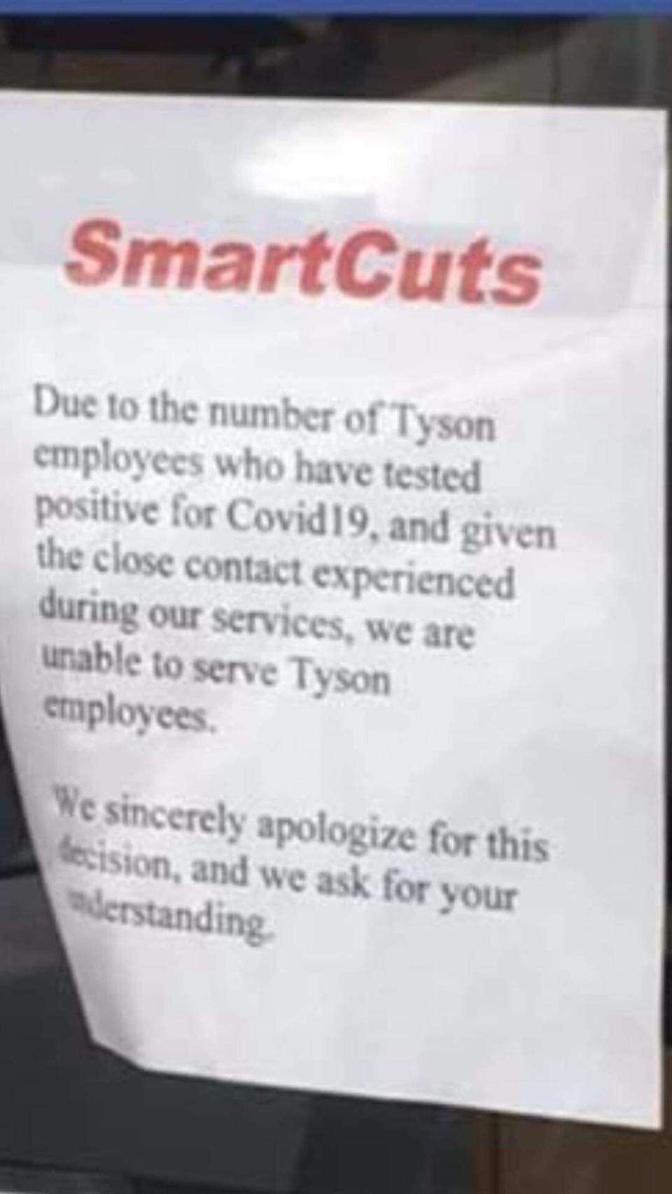 A photo of the sign in the window of SmartCuts in Wilkesboro, North Carolina. (Photo: Facebook)