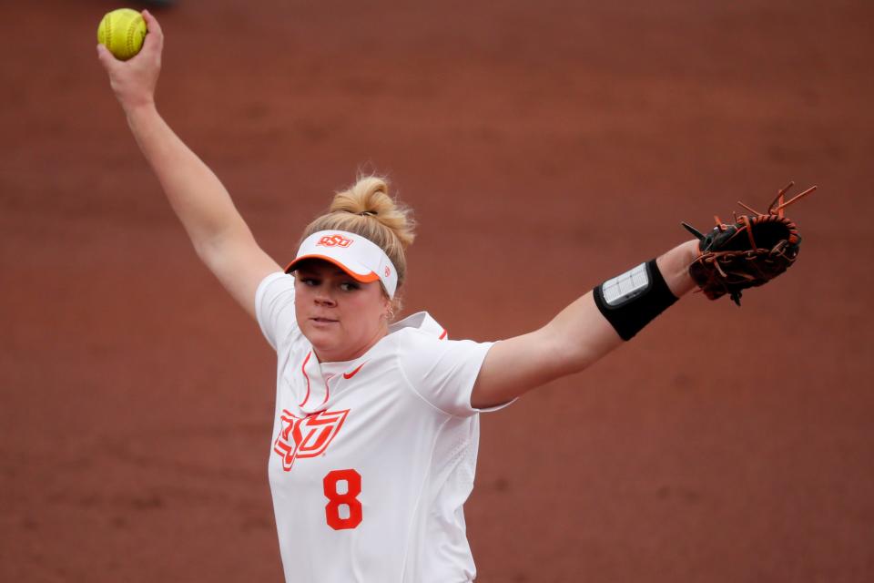 Oklahoma State's Lexi Kilfoyl (8) pitches during a college softball game between the Oklahoma State Cowgirls (OSU) and the University of North Texas in Stillwater, Okla., Wednesday, March 22, 2023. 