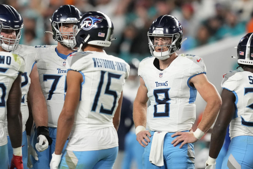 Tennessee Titans quarterback Will Levis (8) and the offensive line wait for the game to resume during the first half of an NFL football game against the Miami Dolphins, Monday, Dec. 11, 2023, in Miami. (AP Photo/Rebecca Blackwell)