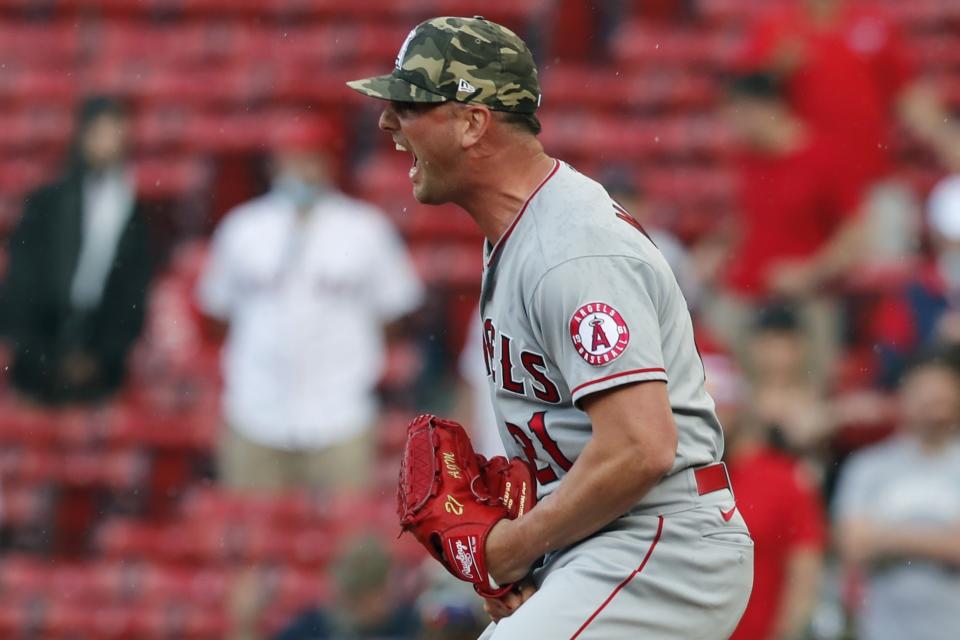 Los Angeles Angels' Mike Mayers reacts after striking out Boston Red Sox's Michael Chavis to end the baseball game during the ninth inning, Sunday, May 16, 2021, in Boston. (AP Photo/Michael Dwyer)