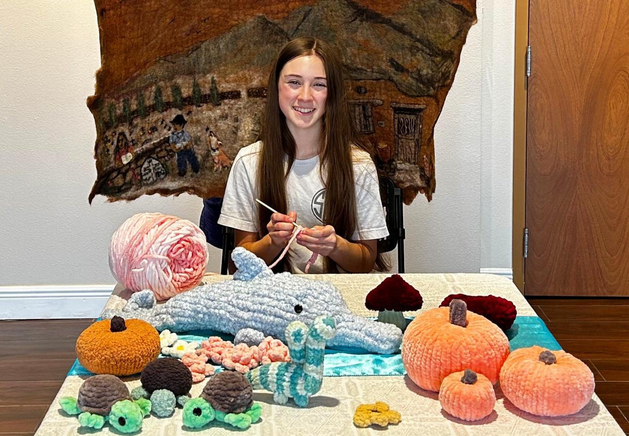 Mikayla Norwitch crochets items for the Autumn Fiber, Art & Craft Event on Oct. 29 at Temple Israel of Brevard in Viera. More than two dozen vendors and fiber artisans will take part.