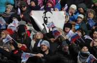 <p>People take part in a rally to support Russian President Vladimir Putin in the upcoming presidential election at Luzhniki Stadium in Moscow, Russia, March 3, 2018. (Photo: Maxim Shemetov/Reuters) </p>