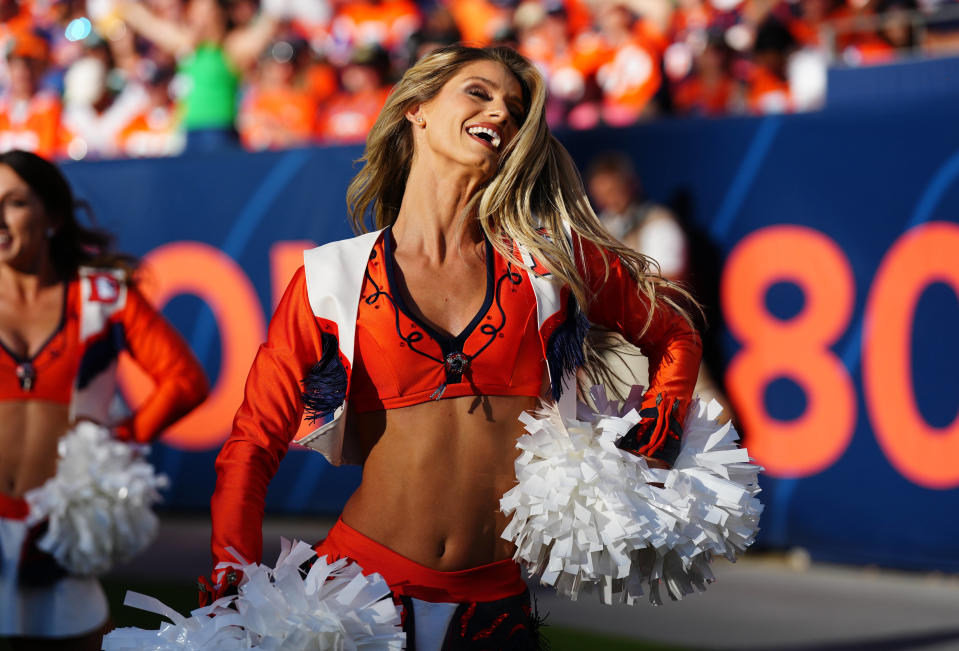 Oct 8, 2023; Denver, Colorado, USA; Denver Broncos cheerleader Berkleigh Wright performs in the second half against the <a class="link " href="https://sports.yahoo.com/nfl/teams/ny-jets/" data-i13n="sec:content-canvas;subsec:anchor_text;elm:context_link" data-ylk="slk:New York Jets;sec:content-canvas;subsec:anchor_text;elm:context_link;itc:0">New York Jets</a> at Empower Field at Mile High. Mandatory Credit: Ron Chenoy-USA TODAY Sports