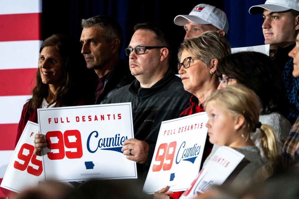 Supporters of Ron DeSantis stand before DeSantis takes the stage during the final event of a 99 county tour of Iowa on Saturday, December 2, 2023 in Newton.