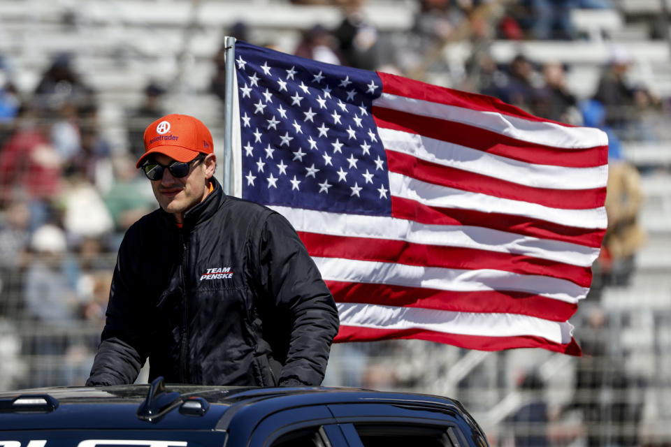 NASCAR Cup Series driver Joey Logano rides to pit road before the start of the Ambetter Health 400 auto race at Atlanta Motor Speedway, Sunday, March 19, 2023, in Hampton, Ga. (AP Photo/Butch Dill)