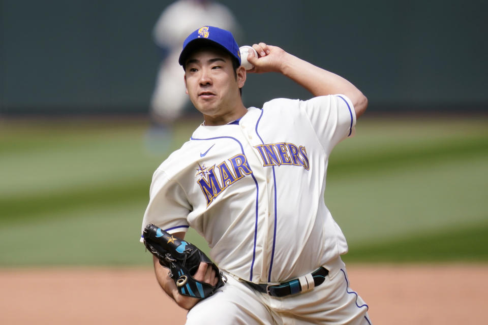 Seattle Mariners starting pitcher Yusei Kikuchi throws against the Texas Rangers in the sixth inning of a baseball game Sunday, May 30, 2021, in Seattle. (AP Photo/Elaine Thompson)