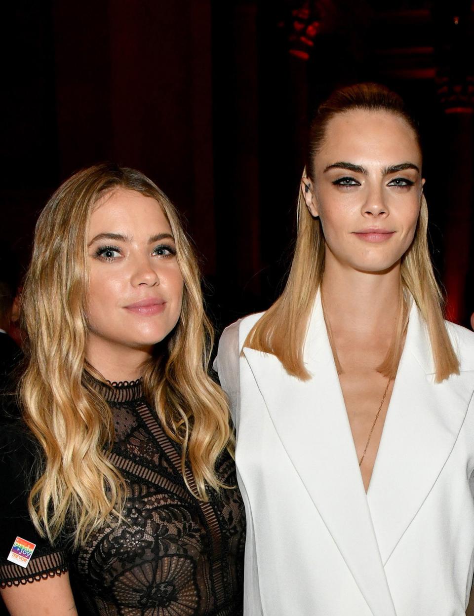 The model is celebrating Pride with help from <a href="https://people.com/style/cara-delevingne-ashley-benson-bond-nyc-before-met-gala/" rel="nofollow noopener" target="_blank" data-ylk="slk:rumored girlfriend;elm:context_link;itc:0;sec:content-canvas" class="link ">rumored girlfriend</a> Ashley Benson. The 26-year-old shared a steamy clip from the movie <em>Her Smell</em> on Instagram, featuring her pulling Benson in close to share a passionate kiss. "#PRIDE 🌈❤️😍🌈❤️😍 @ashleybenson," Delevingne captioned the <a href="https://www.instagram.com/p/Bytg7Khlo_t/" rel="nofollow noopener" target="_blank" data-ylk="slk:post;elm:context_link;itc:0;sec:content-canvas" class="link ">post</a>. The <em>Pretty Little Liars</em> actress responded with three red heart emojis in the comments section, prompting Delevingne to reply, "Sprinks" with a heart eyes emoji.