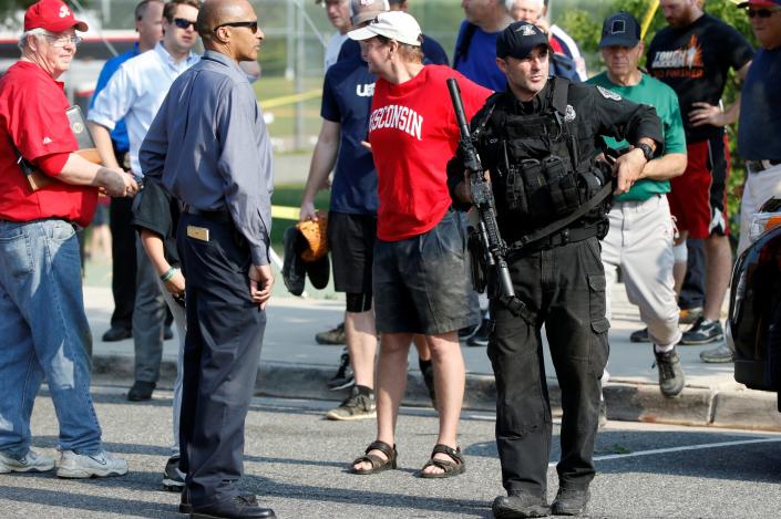 <p>Police investigate a shooting scene after a gunman opened fire on Republican members of Congress during a baseball practice near Washington in Alexandria, Virginia, June 14, 2017. (Photo: Joshua Roberts/Reuters) </p>