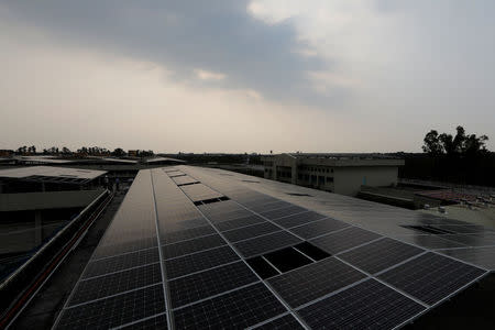 Solar panels are seen on the roof of Pingtung Prison in Pingtung, Taiwan February 15, 2017. REUTERS/Tyrone Siu