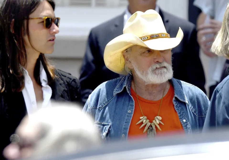 FILE - Dickey Betts, a founding member of the Allman Brothers Band, exits the funeral of Gregg Allman at Snow's Memorial Chapel, June 3, 2017, in Macon, Ga. Guitar legend Betts, who co-founded the Allman Brothers Band and wrote their biggest hit, “Ramblin’ Man,” died Thursday, April 18, 2024. He was 80. (Jason Vorhees/The Macon Telegraph via AP, File)