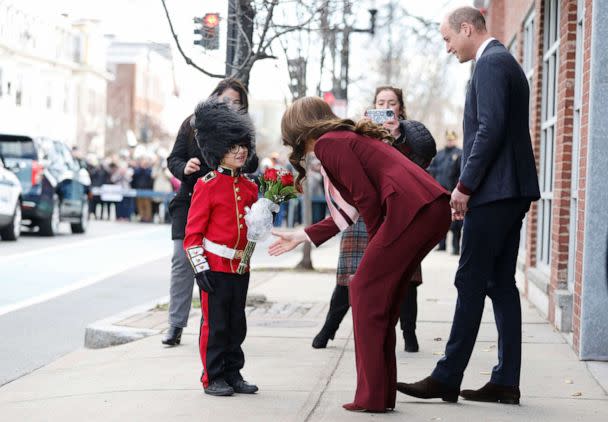 PHOTO: Henry Dynov-Teixeria, 8, presents flowers to Prince William and Kate, Princess of Wales, as his parents Melissa, left, and Irene, look on following a visit to Greentown Labs, Dec. 1, 2022, in Somerville, Mass. (Cj Gunther/AP)