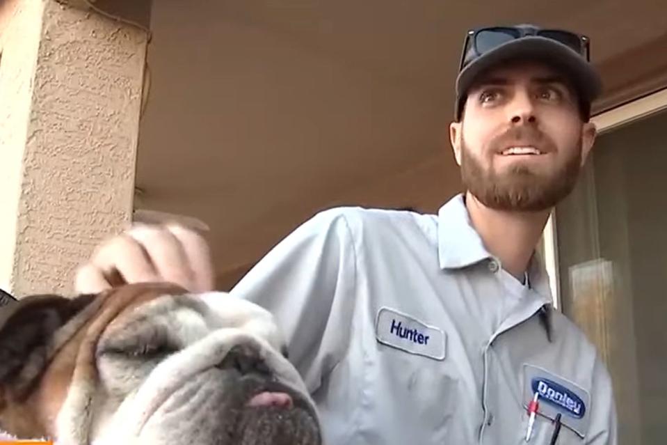 <p>AZFamily | Arizona News/YouTube</p> Hunter Hitchens with Malone the dog