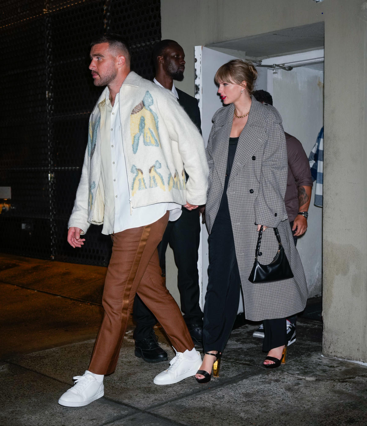 Taylor Swift and Travis Kelce Hold Hands While Leaving Stadium After ...