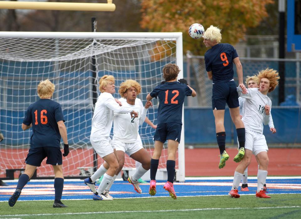 Rochester’s Major Gibson heads the ball after a corner kick during the Class 2A state semifinal match against Crystal Lake South at Hoffman Estates High School on Friday, Nov. 3, 2023.