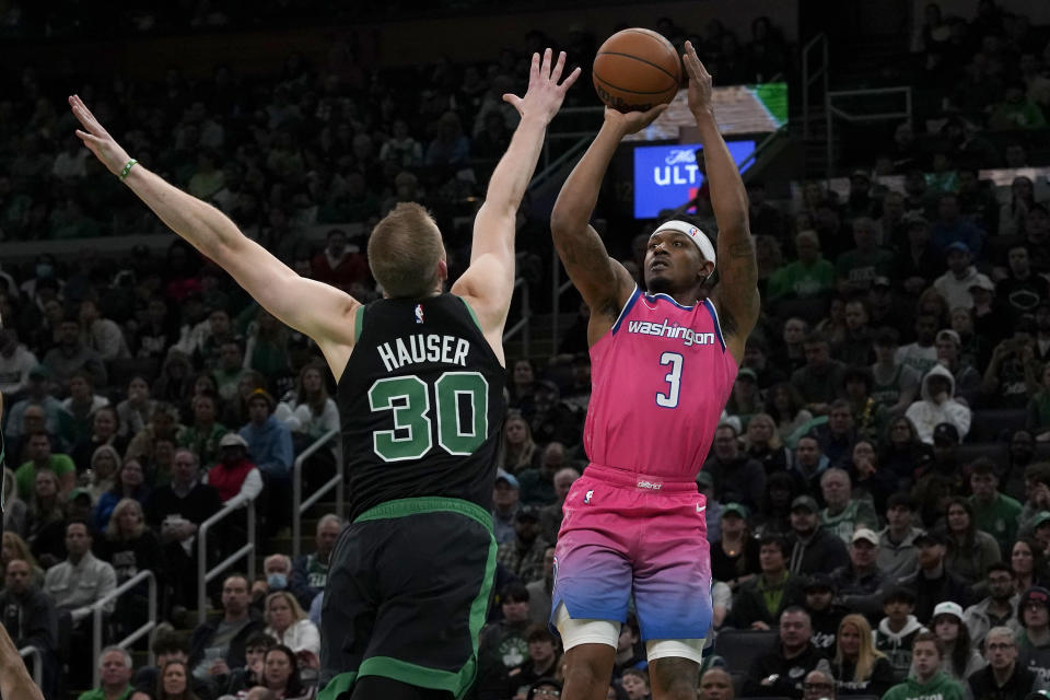 Washington Wizards guard Bradley Beal (3) shoots against Boston Celtics forward Sam Hauser (30) during the first half of an NBA basketball game Sunday, Nov. 27, 2022, in Boston. (AP Photo/Mary Schwalm)