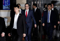 U.S. Treasury Secretary Steven Mnuchin, a member of the U.S. trade delegation to China, leaves a hotel in Beijing, China February 15, 2019. REUTERS/Jason Lee