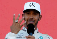 <p>Formula One F1 – Japanese Grand Prix 2017 – Suzuka Circuit, Japan – October 8, 2017. Mercedes’ Lewis Hamilton of Britain gestures as he celebrates winning the race. REUTERS/Toru Hanai</p>