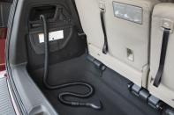 <p>Honda introduced its HondaVac-a built-in Shop-Vac vacuum-in the 2014 Odyssey (read our review of the vacuum <a href="http://blog.caranddriver.com/2014-honda-odyssey-elite-hondavac-sucking-by-the-numbers/" rel="nofollow noopener" target="_blank" data-ylk="slk:here;elm:context_link;itc:0;sec:content-canvas" class="link ">here</a>). It continues in the new Odyssey, once again tucked into the rear cargo area on Touring and Elite trims. The vacuum can operate continuously with the engine running or for up to eight minutes with the V-6 off, and its hoses are long enough to enable sucking up crumbs from the farthest reaches of the van’s interior.</p>