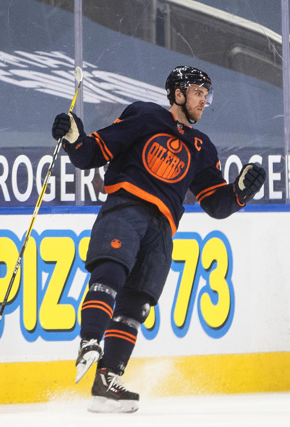 Edmonton Oilers' Connor McDavid celebrates a goal against the Calgary Flames during the first period of an NHL hockey game Saturday, May 1, 2021, in Edmonton, Alberta. (Jason Franson/The Canadian Press via AP)