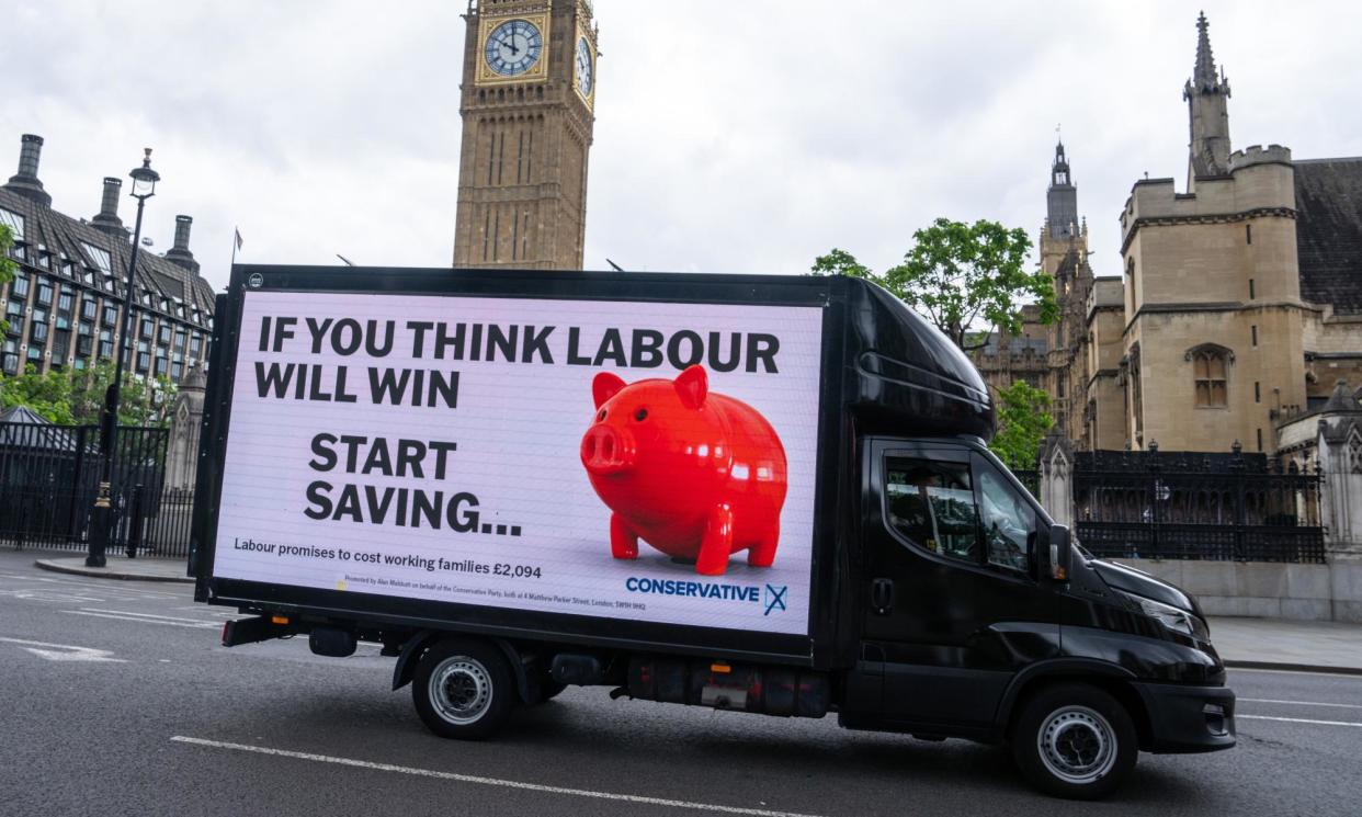 <span>An advertising van for the Conservative party in Parliament Square in May.</span><span>Photograph: Carl Court/Getty Images</span>