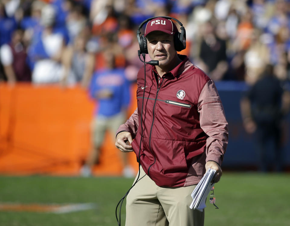 Florida State head coach Jimbo Fisher watches play against Florida during the second half of an NCAA college football game, Saturday, Nov. 25, 2017, in Gainesville, Fla. Florida State won 38-22. (AP Photo/John Raoux)