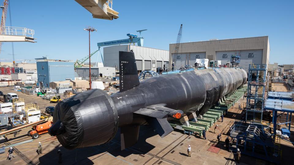 Using a transfer car system, the Virginia-class submarine Montana (SSN 794) was successfully transferred from a construction facility to a floating dry dock at Newport News Shipbuilding division in preparation for its launch. Photo by Matt Hildreth/HII.