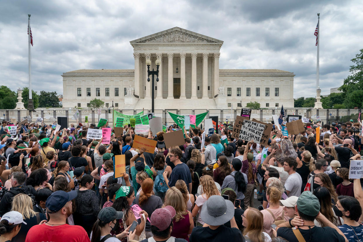 Abortion-rights protesters gather following the Supreme Court's decision to overturn Roe v. Wade, outside the Supreme Court in Washington, D.C., June 24, 2022.