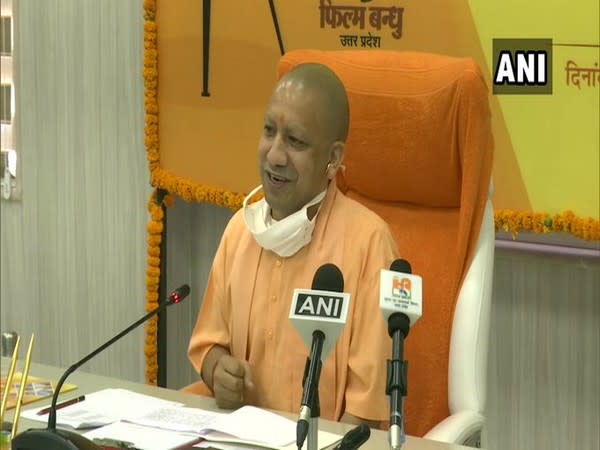 Uttar Pradesh Chief Minister Yogi Adityanath meeting with representatives of film industries. Photo/ANI