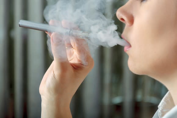 Woman using an electronic cigarette