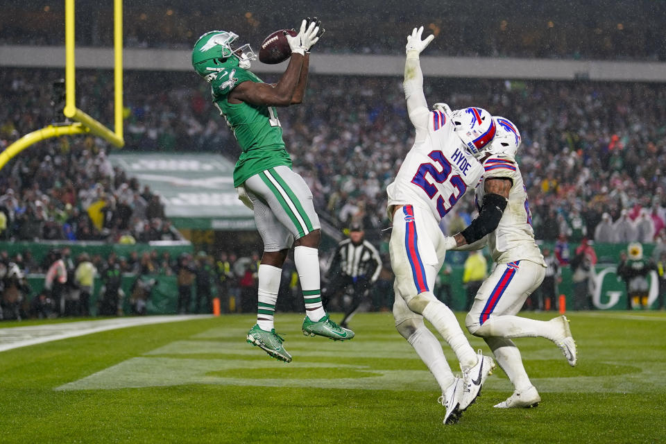 Philadelphia Eagles wide receiver Olamide Zaccheaus catches a touchdown pass over Buffalo Bills safety Micah Hyde during the second half of an NFL football game Sunday, Nov. 26, 2023, in Philadelphia. (AP Photo/Matt Slocum)